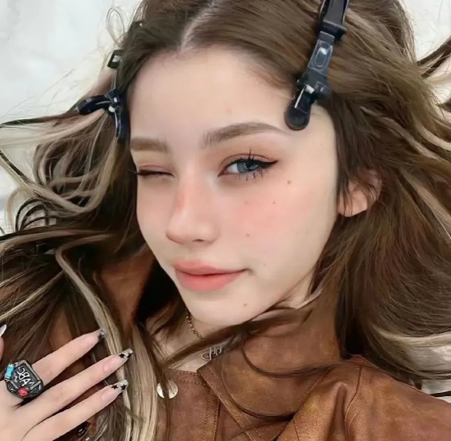 千钧。一发